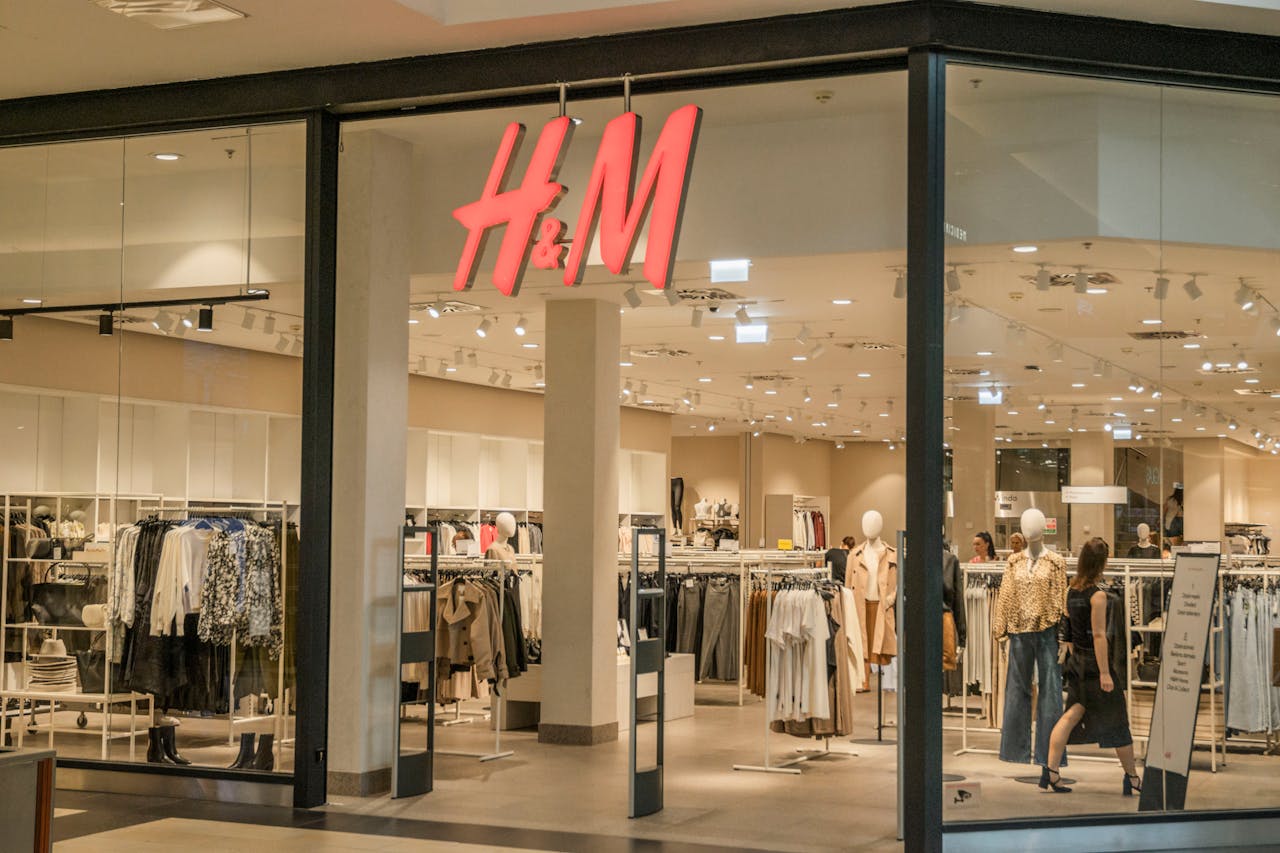 hero-img-01 Explore the modern design and fashion collection at this H&M store located in a bustling shopping mall.
